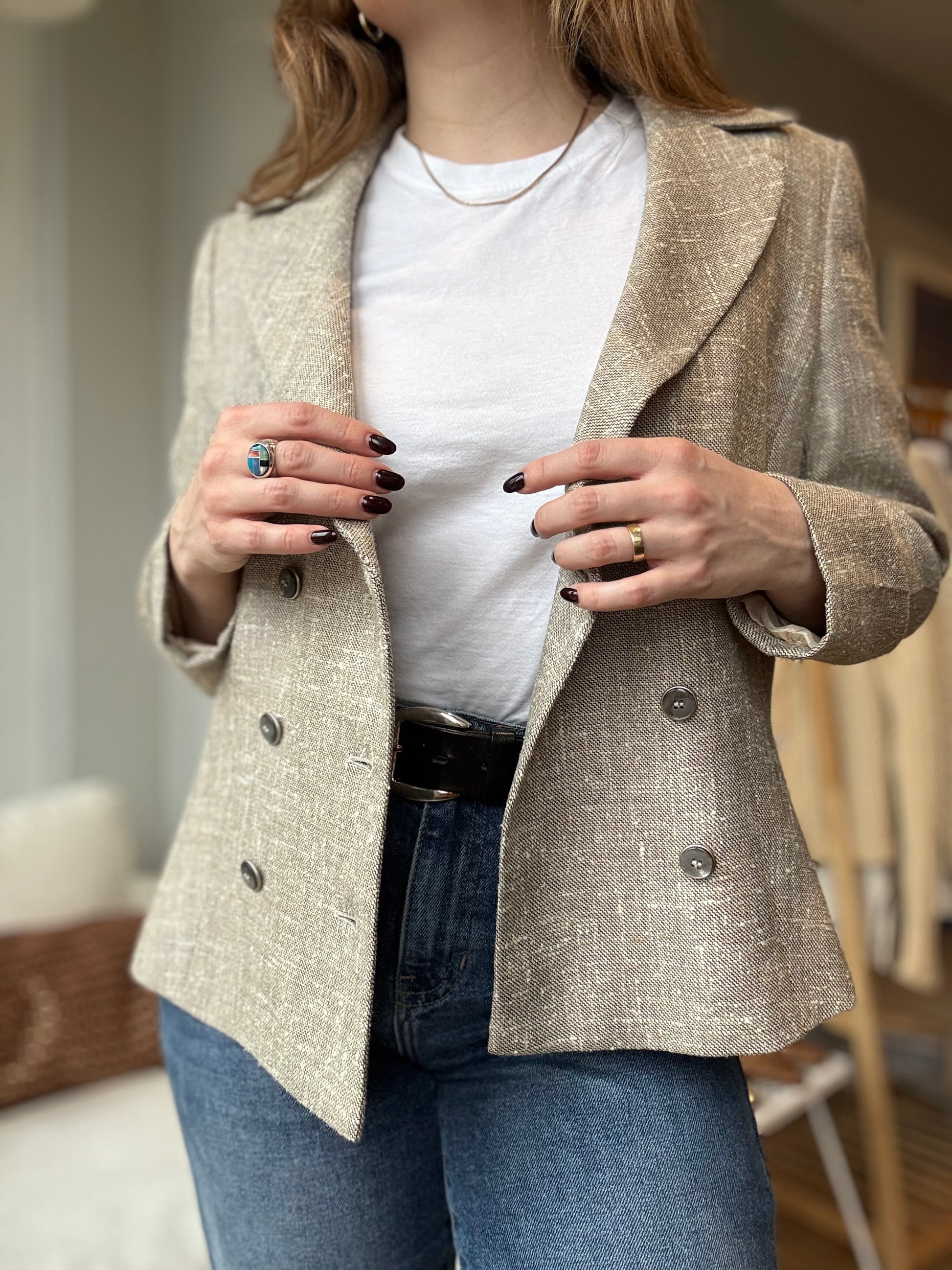 Preloved Escada blazer paired with jeans and gold jewelry for a tailored chic look for women.