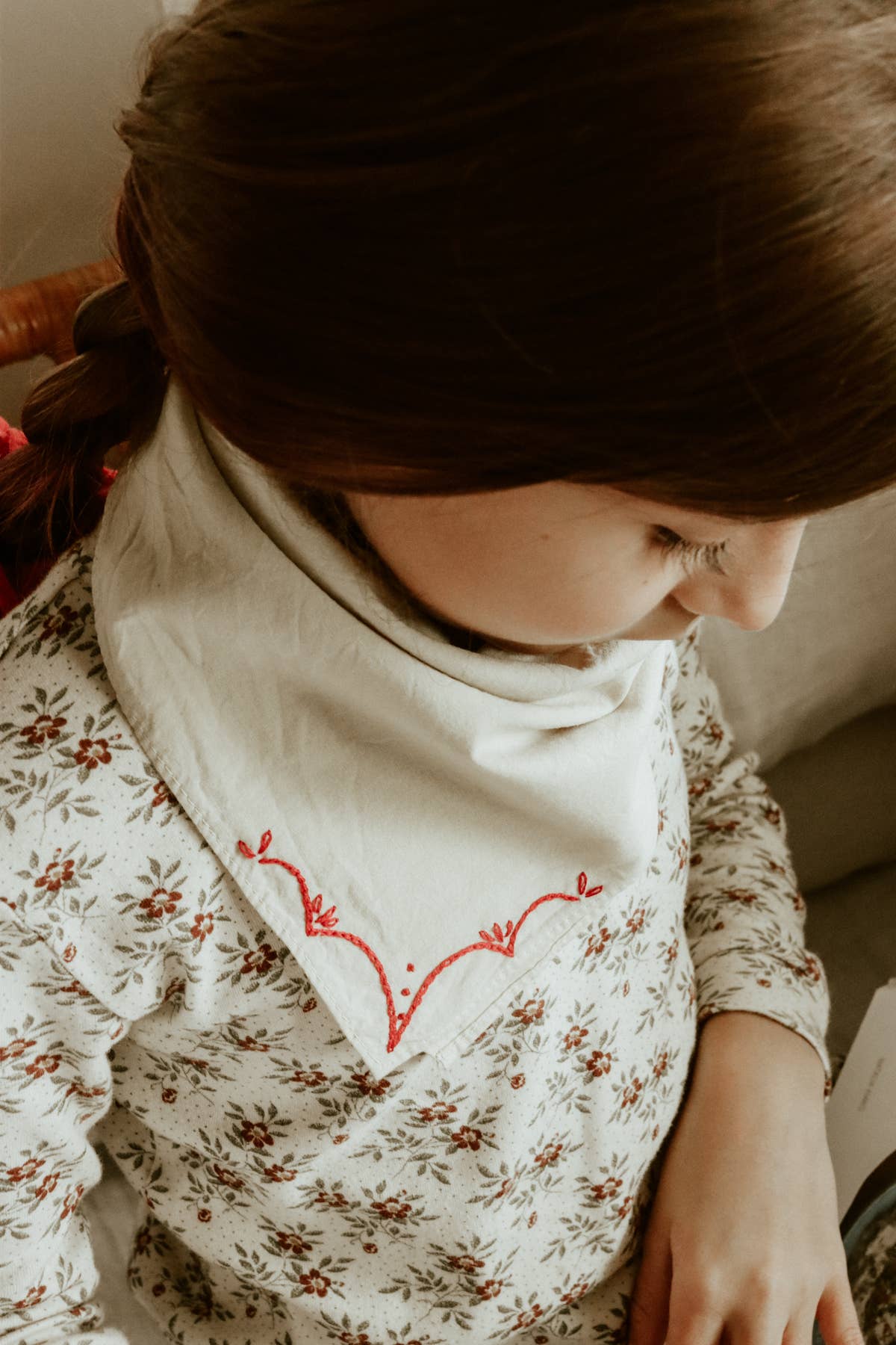 Hand-dyed embroidered rodeo cotton bandana in sandy white/red thread