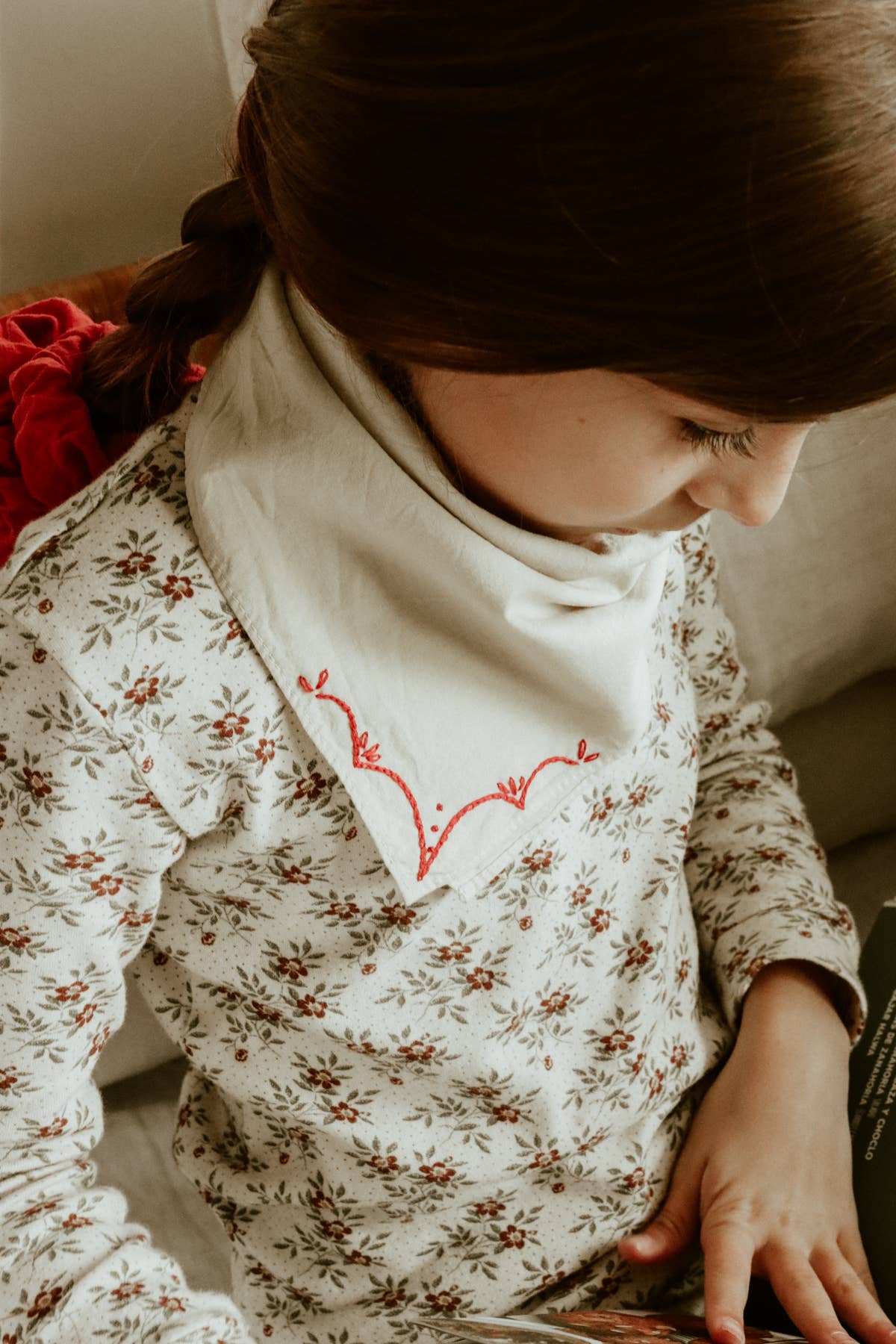 Hand-dyed embroidered rodeo cotton bandana in sandy white/red thread