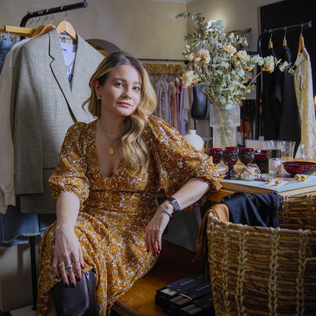 Petals And Jackets Vintage & Modern Boutique Owner, Leah Ziegler, at her Chicago store front