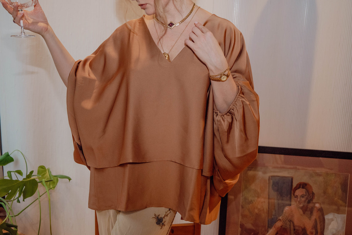 Chicago Vintage Store owner wears a draped timeless Calvin Klein vintage blouse in Antique Rose for a Chic holiday outfit. 