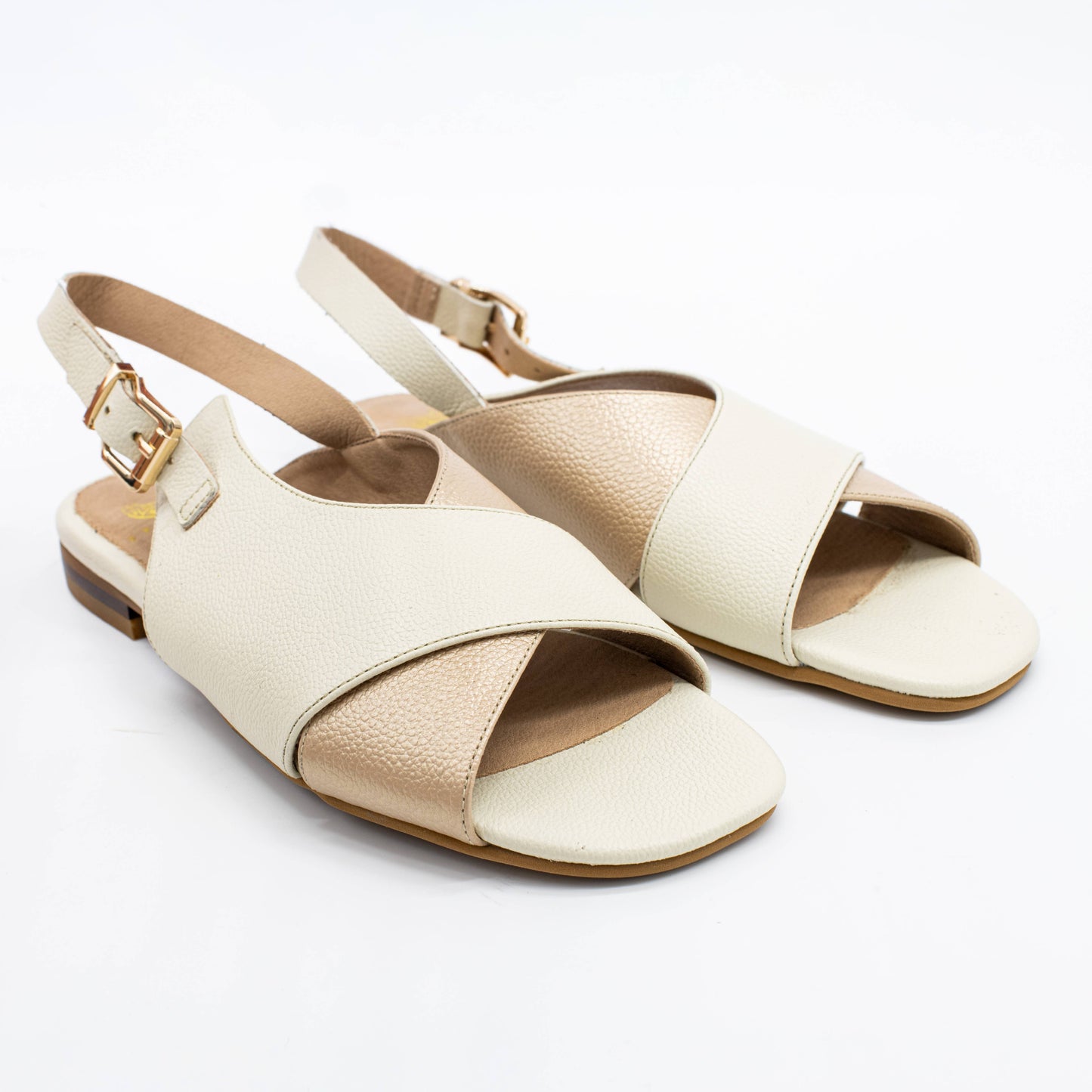 The Empower Sandals in ivory/gold leather